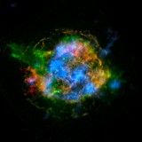 In this false-color image, NuSTAR data, which show high-energy X-rays from radioactive material, are colored blue. Lower-energy X-rays from non-radioactive material, imaged previously with NASA’s Chandra X-ray Observatory, are shown in red, yellow and green. (NASA/JPL-Caltech/CXC/SAO.)